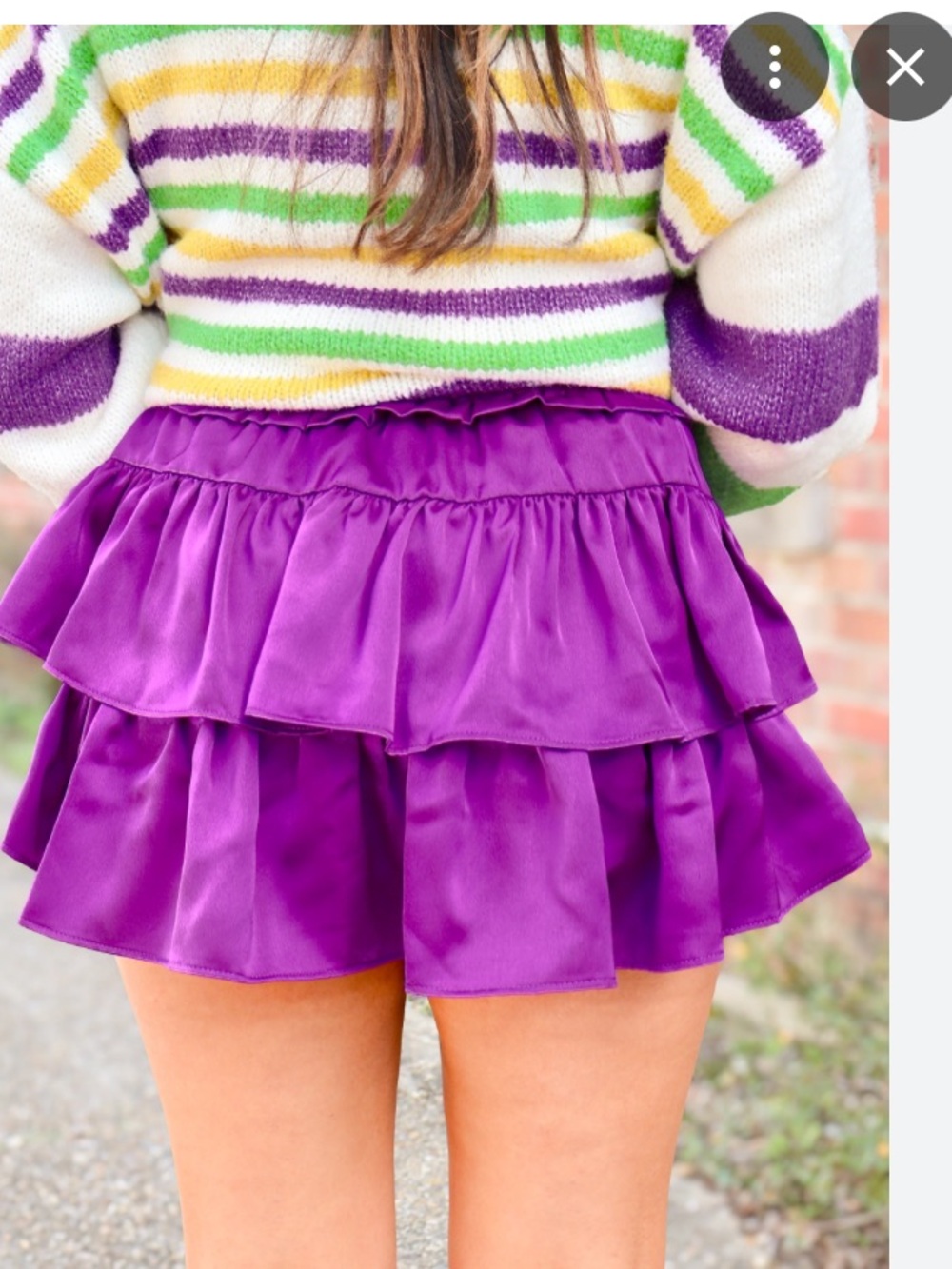 Purple Tiered Mini skirt that has shorts under them.